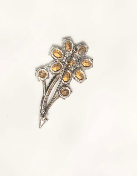 Flower brooch with rhinestones view of the back