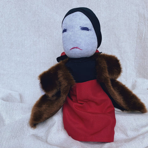 Little Edie Doll in her fur coat and black scarf