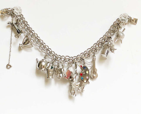 Little Edie Vintage Sterling silver charm bracelet with 12 charms