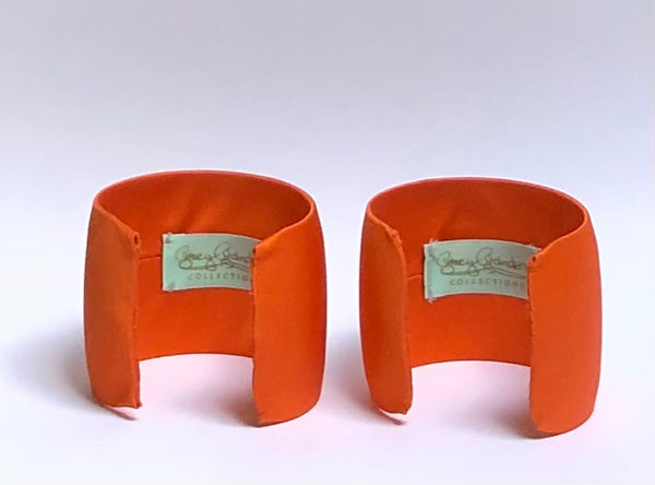 Orange silk cuffs embellished with deco buckle with rhinestones -back showing labels