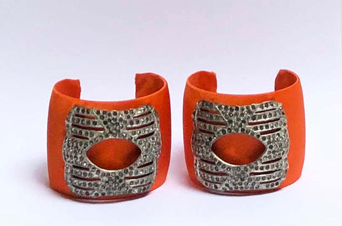 Orange silk cuffs embellished with deco buckle with rhinestones