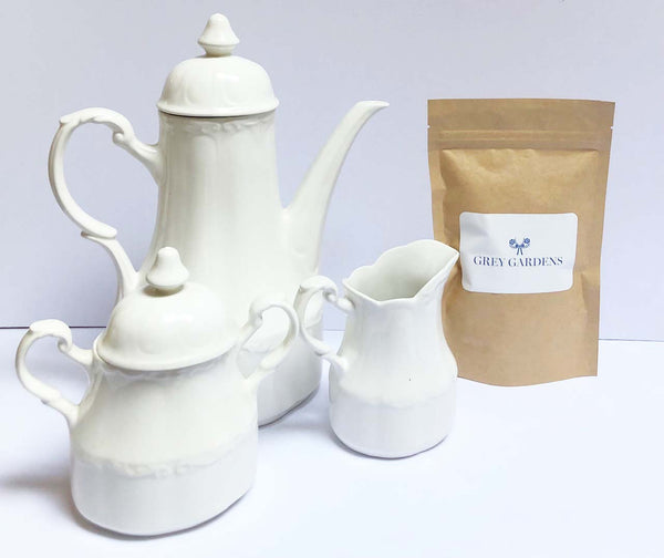 White ironstone 5 piece tea set with packaged tea
