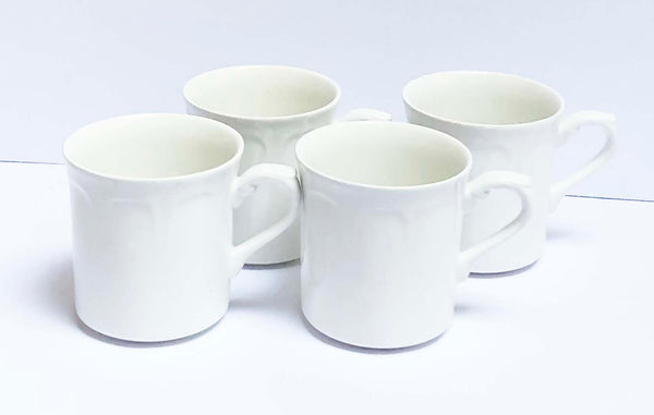 set of 4 white ironstone tea cups 