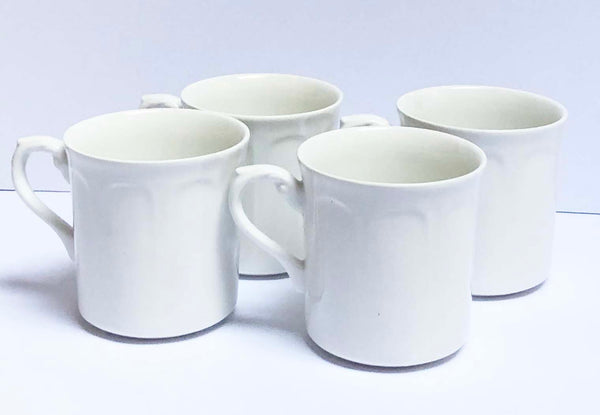 4  Ironstone tea cups Sterling pattern
